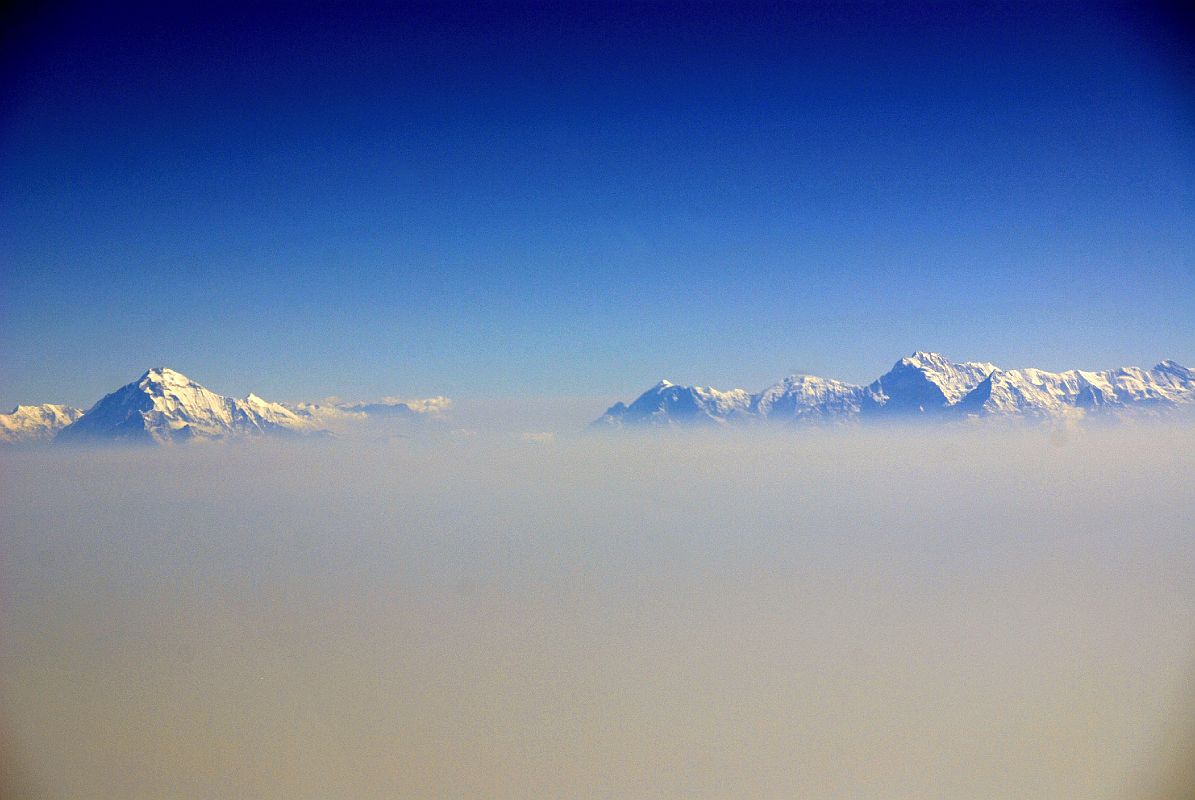01 Flight To Kathmandu 03 Dhaulagiri, Nilgiri, Annapurna Dhaulagiri, Nilgiri, and Annapurna from the early morning flight from Doha to Kathmandu.